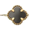 Bracelet 750/18K Gelbgold mit Malachit und Onyx Steinen, 19cm